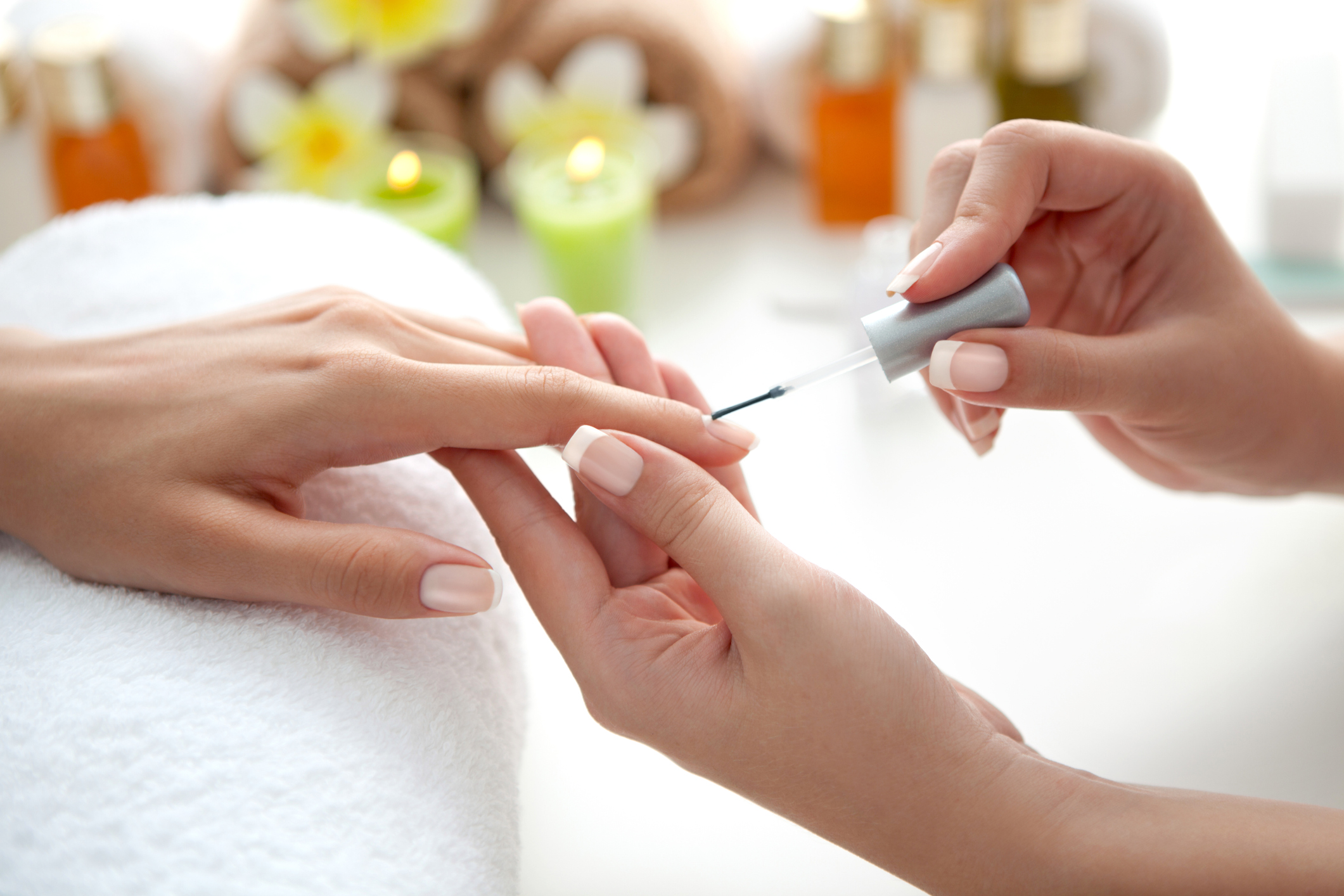 Spa procedure for nail care in a beauty salon. Female hands and tools for  manicure on pink background. 4908533 Stock Photo at Vecteezy