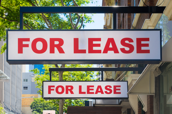 For Lease signs on display outside buildings For Lease signs on display outside buildings